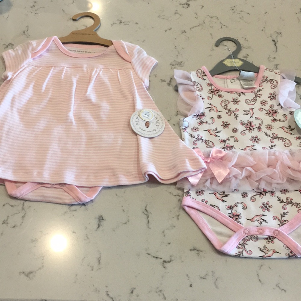 Pink onesie and striped dress onesie